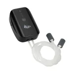 A black air pump with white tube.