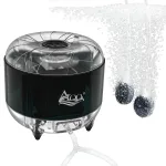 Black air pump for oxygenating in aquarium.